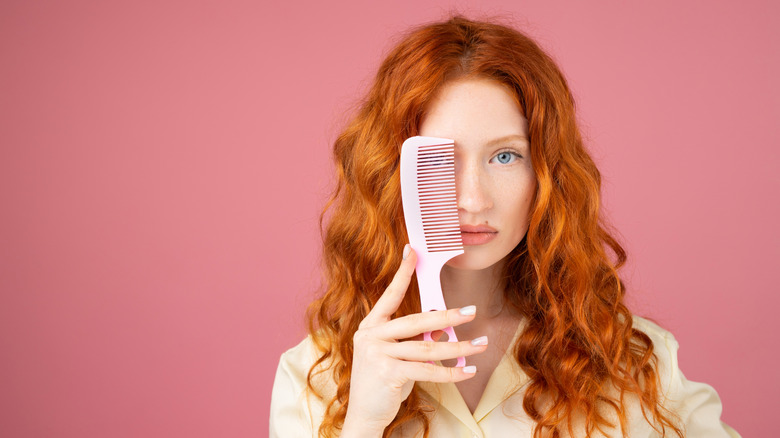 Woman with wavy red hair