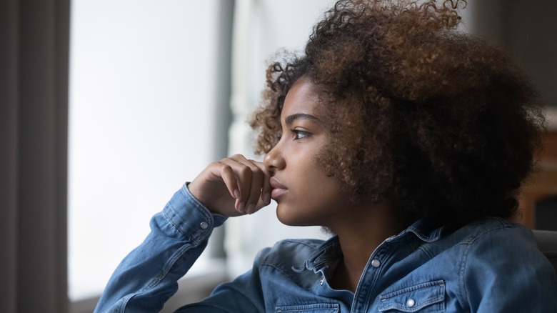 Sad woman staring into space