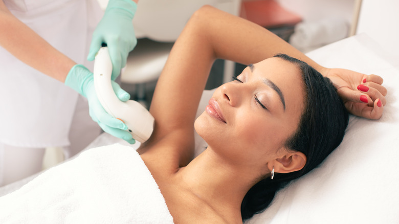 Woman getting laser hair removal 