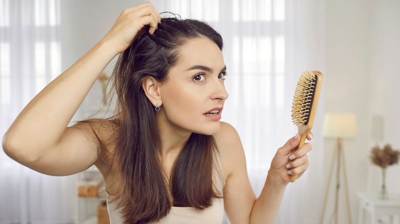 woman with hairbrush