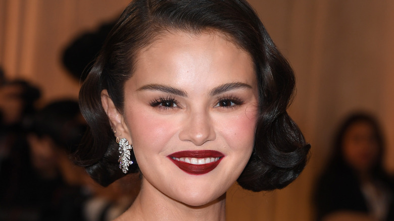 Selena Gomez smiles at an event