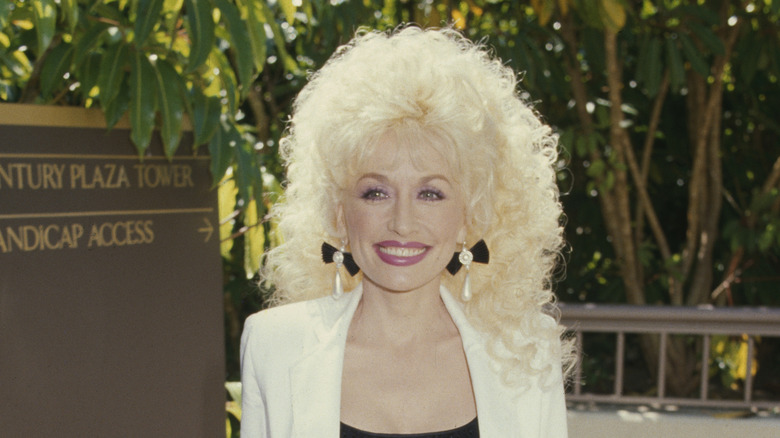 Dolly Parton with long, curly hair