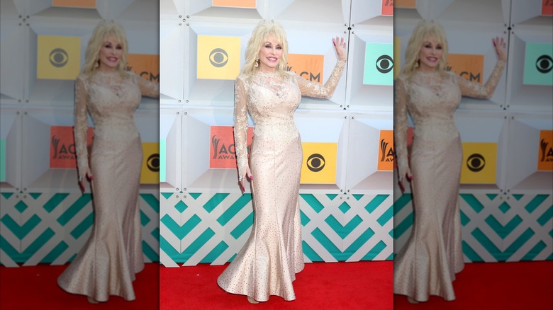Dolly Parton wears a beige lace dress to the 2016 Academy of Country Music Awards