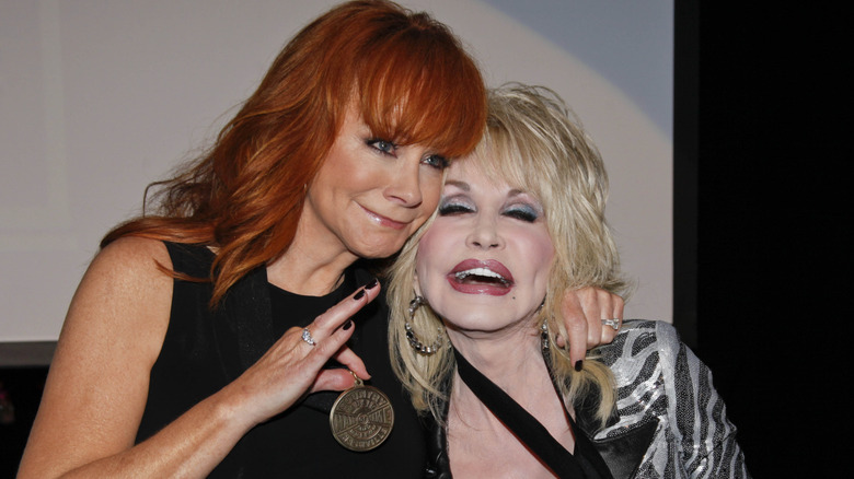 Reba McEntire and Dolly Parton in 2011.