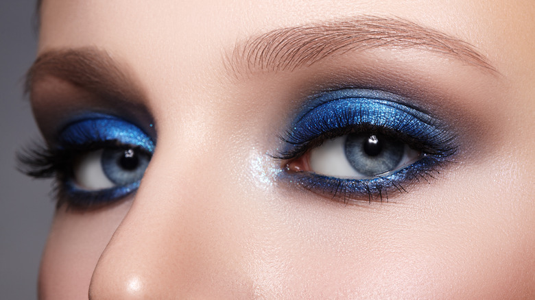 Woman with blue eyeshadow 