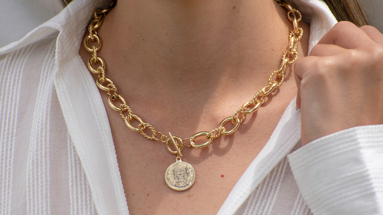 Gold medallion necklace