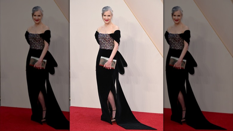 Elizabeth McGovern pictured in 2022 wearing a black off-the-shoulder dress