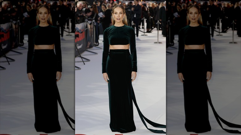 Joanne Froggatt wears an emerald green top and skirt