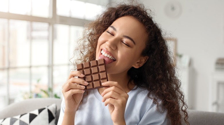 woman eating chocolate