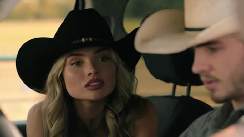 Oreana Jackson wearing a black cowboy hat and red lipstick in a scene from "Dutton Ranch."