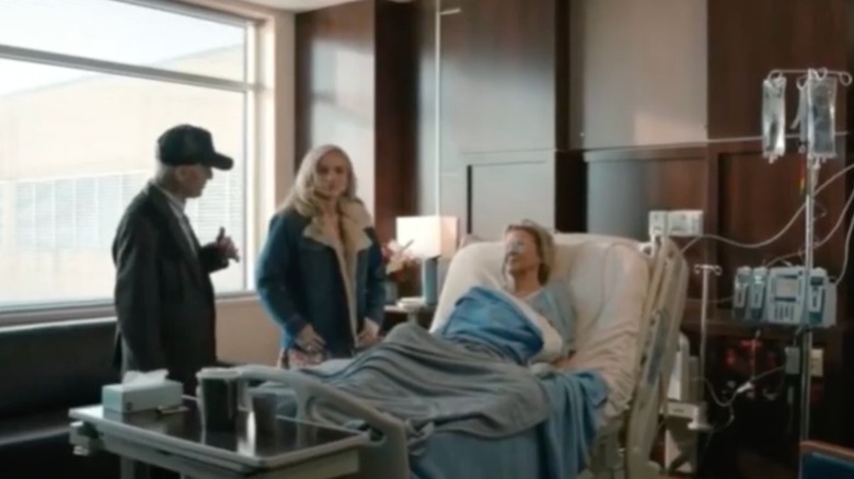Oreana Jackson standing next to a hospital bed wearing a fur-trim denim jacket in a scene from "Dutton Ranch."