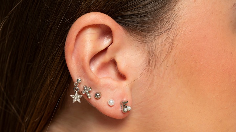 ear with multiple piercings