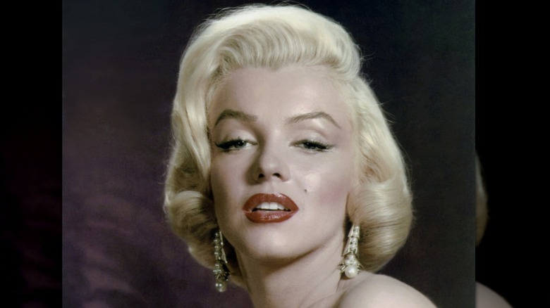Marilyn Monroe wearing pearl earrings