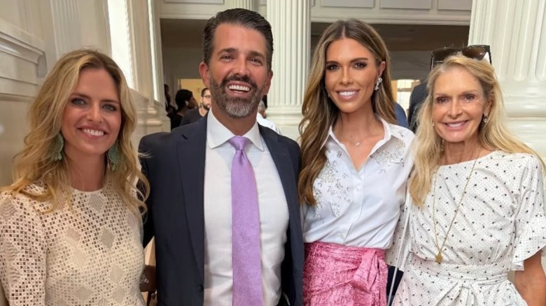 Bettina Anderson in an aging outfit posing beside Don Jr. at the White House Easter egg roll