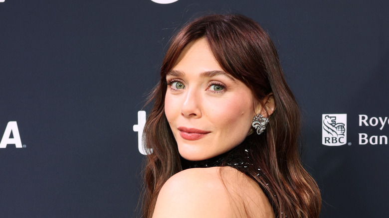 Elizabeth Olsen posing on the red carpet