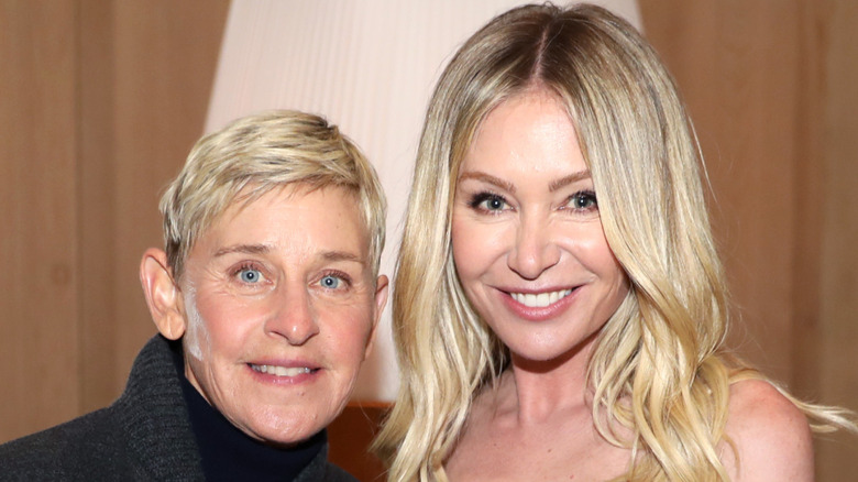 Ellen DeGeneres poses with wife Portia de Rossi at an art gallery