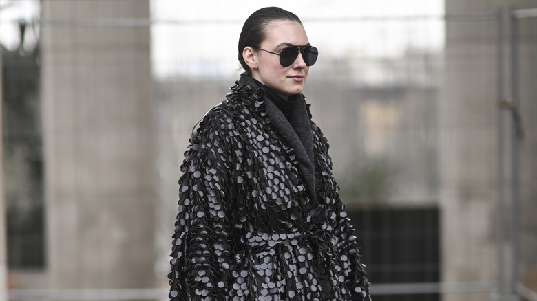 woman waearing sequined coat