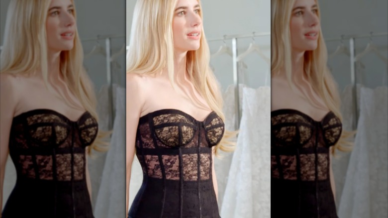Emma Roberts on a black lace dress