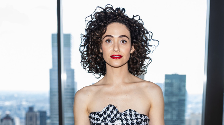Emmy Rossum wearing red lipstick