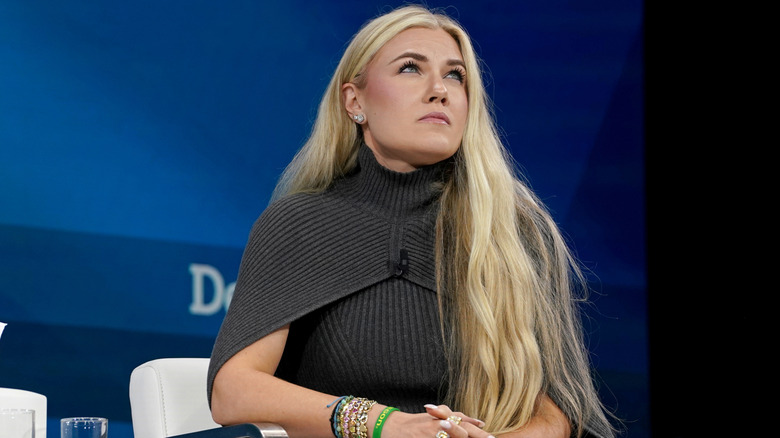 Erika Kirk in a grey sweater dress