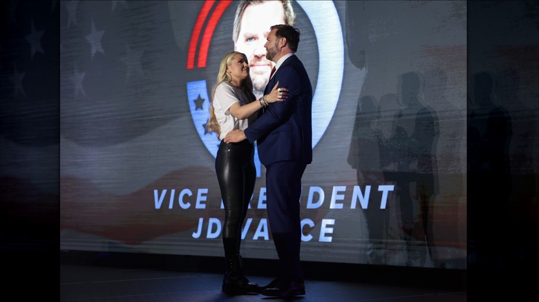 Erika Kirk, widow of Turning Point USA founder Charlie Kirk, and U.S. Vice President JD Vance embrace on stage during a Turning Point USA event at the Pavilion at Ole Miss at the University of Mississippi, on October 29, 2025