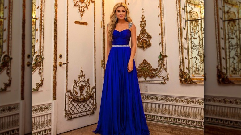 Erika Kirk poses at a party at Mar-a-Lago