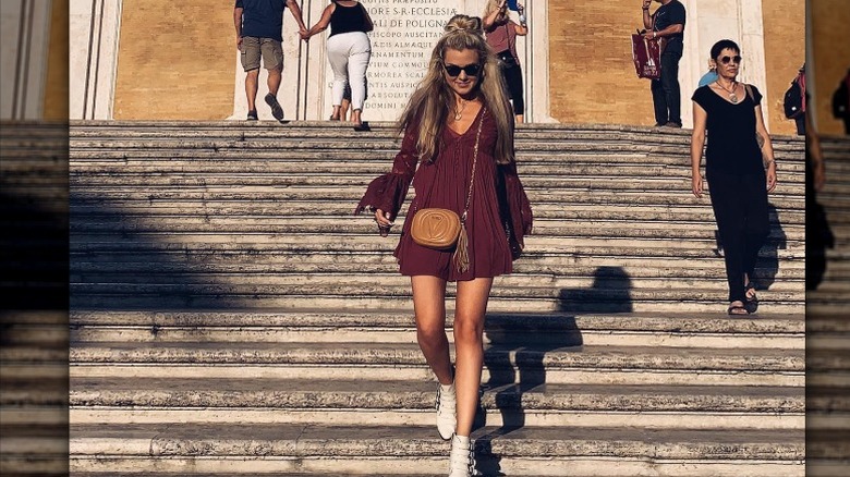 Erika Kirk walking down steps the Spanish Steps in Rome