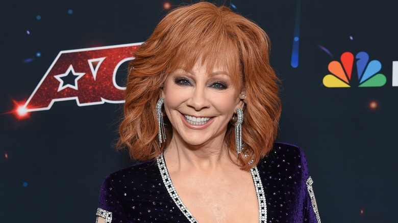 Smiling Reba McEntire at event