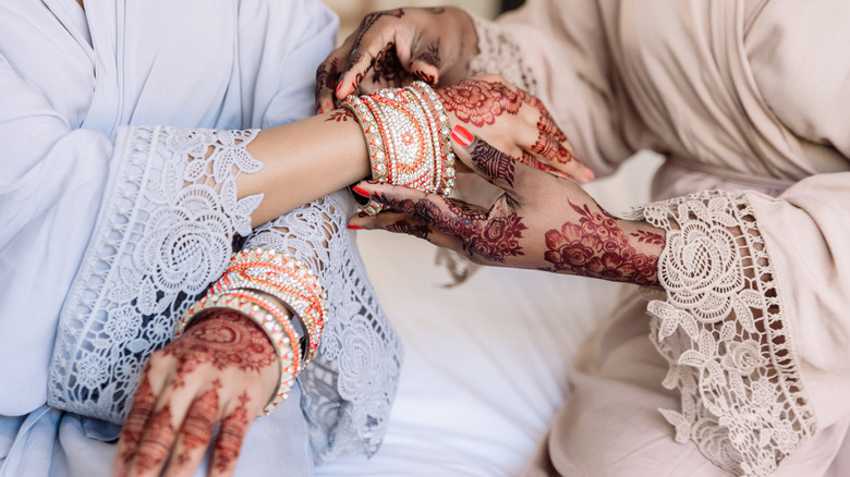 women with henna art