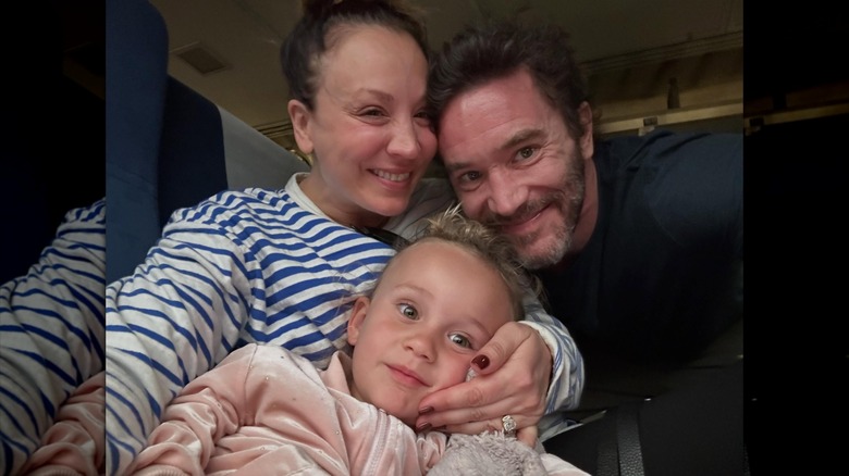 Kaley Cuoco and Tom Pelphrey smiling for a selfie with their daughter Matilda