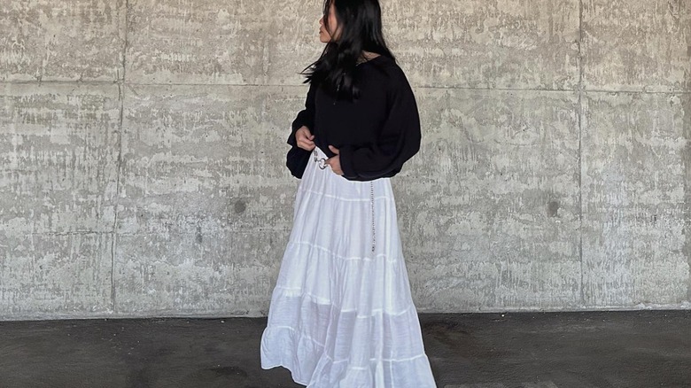 Sweater over a skirt