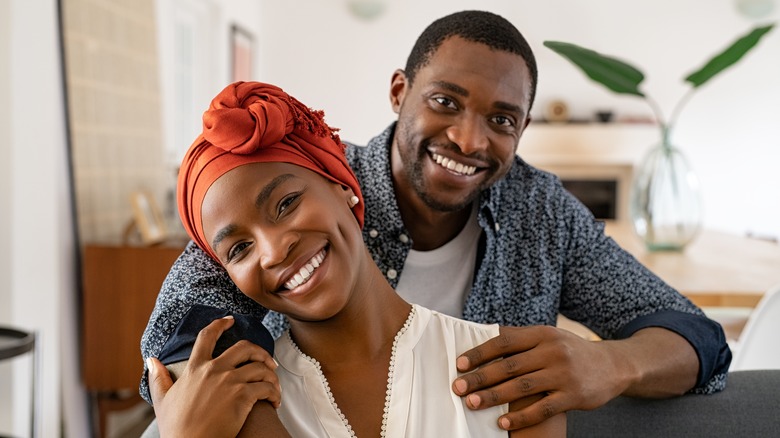 Man and woman smiling 