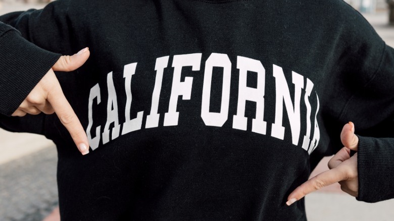 Woman wearing a California sweatshirt