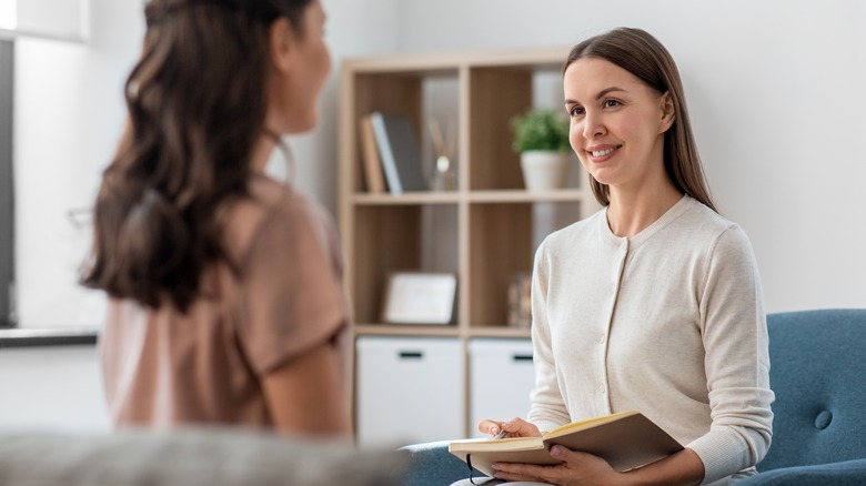 Woman talking to a therapist