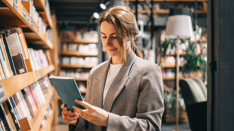 Woman looking at a book