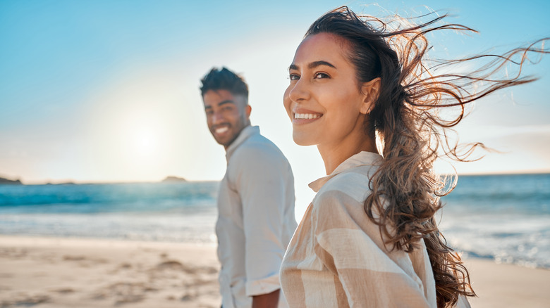 smiling couple on beach