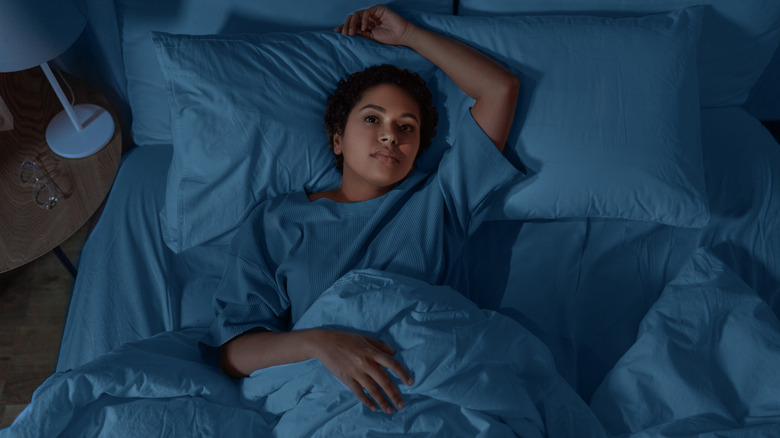 woman awake in bed