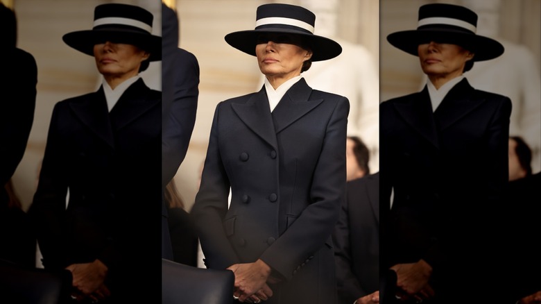 Melania Trump in 2025 in a suit and hat