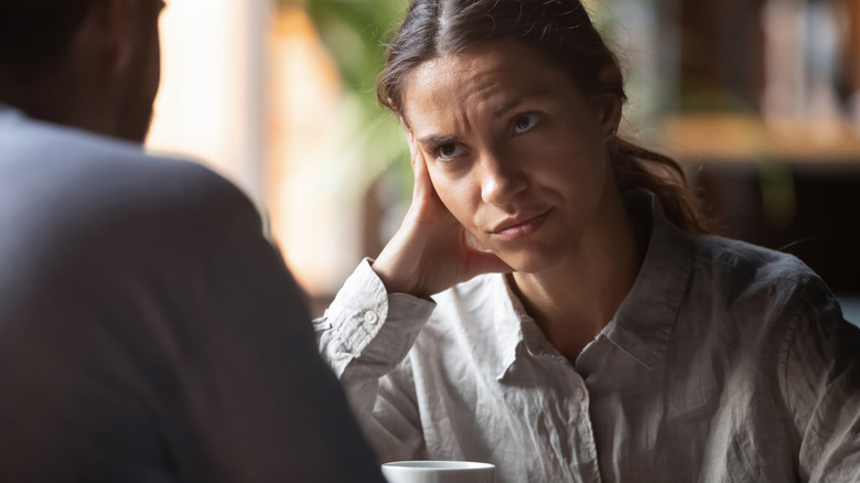 irritated woman on date