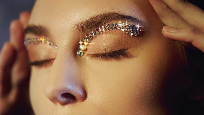 Woman wearing floating crystal eyeliner