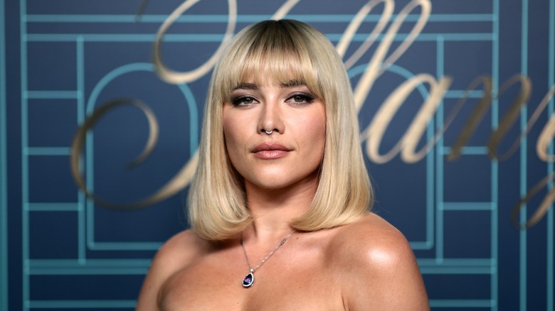 Florence Hugh with vintage heavy bangs and a blunt lob