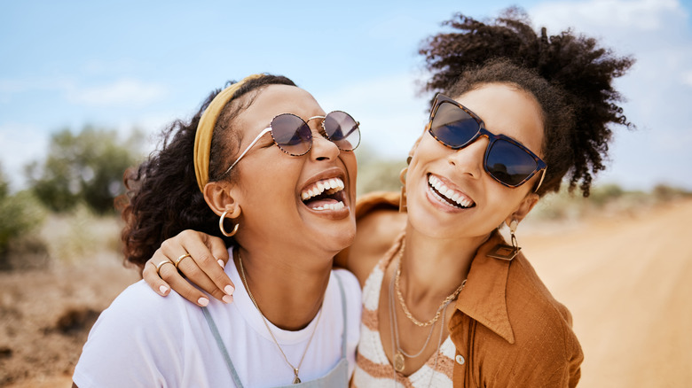 two friends smiling