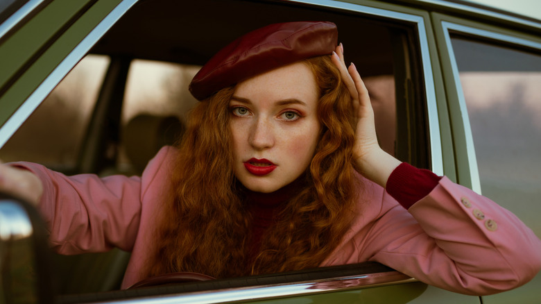 woman red lips driving
