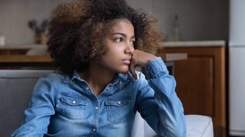 Young woman looking sad