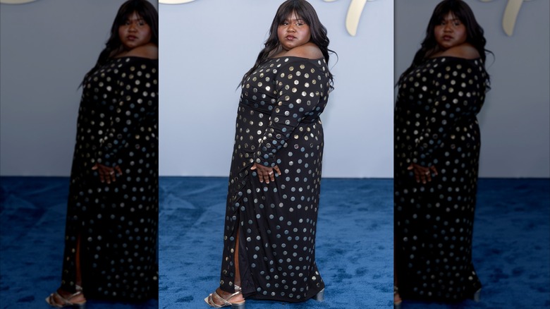 Gabourey Sidibe in a black dress with silver dots