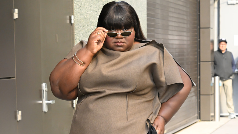Gabourey Sidibe wearing a beige shirt