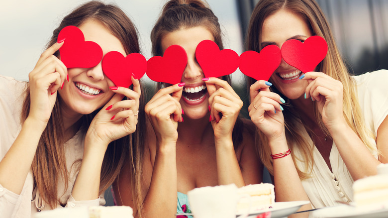 Three women sharing a Galentine's Day