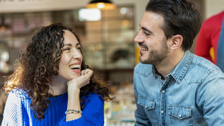Woman and man smiling