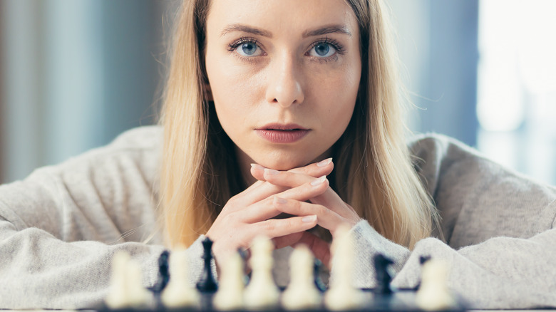 Woman playing chess