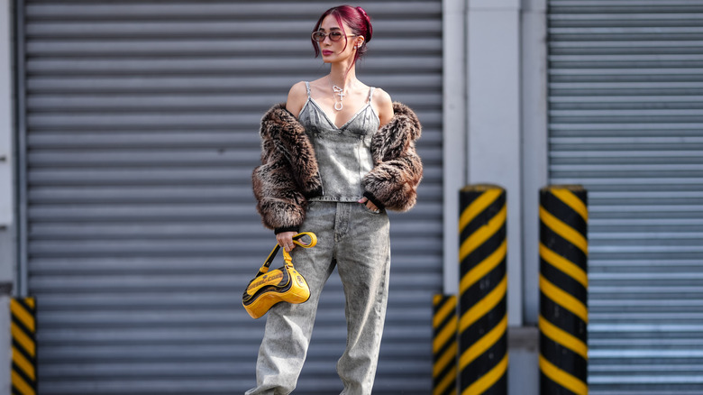 Woman wearing acid wash jeans